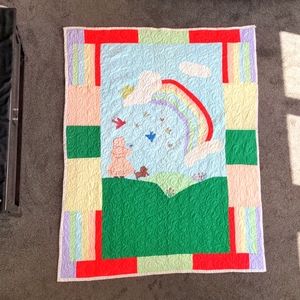 Quilt - girl with book, birds, flowers and rainbow.